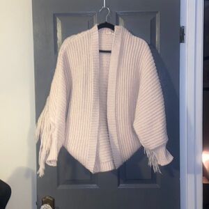 Pale pink fringe knitted shrug